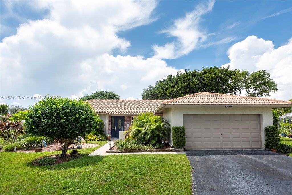 Photo of 10630 NW 41st St, Coral Springs, FL 33065 (MLS # A11879110)