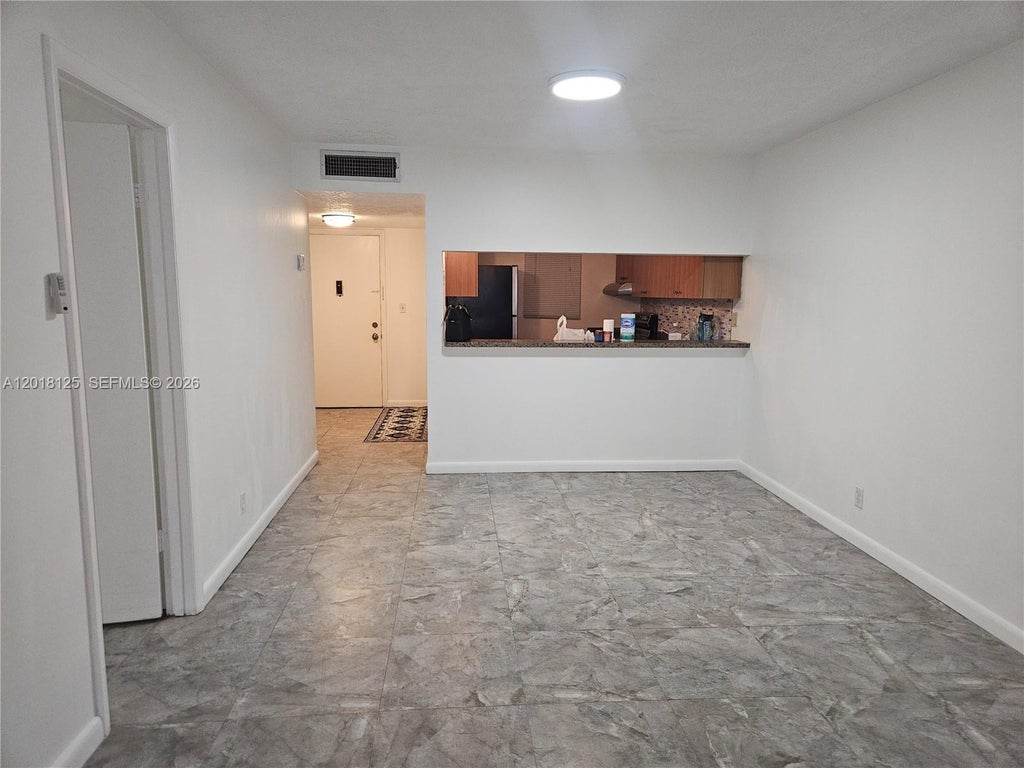 Photo of 7610 Stirling Rd #102C, Davie, FL 33024 (MLS # A12018125)