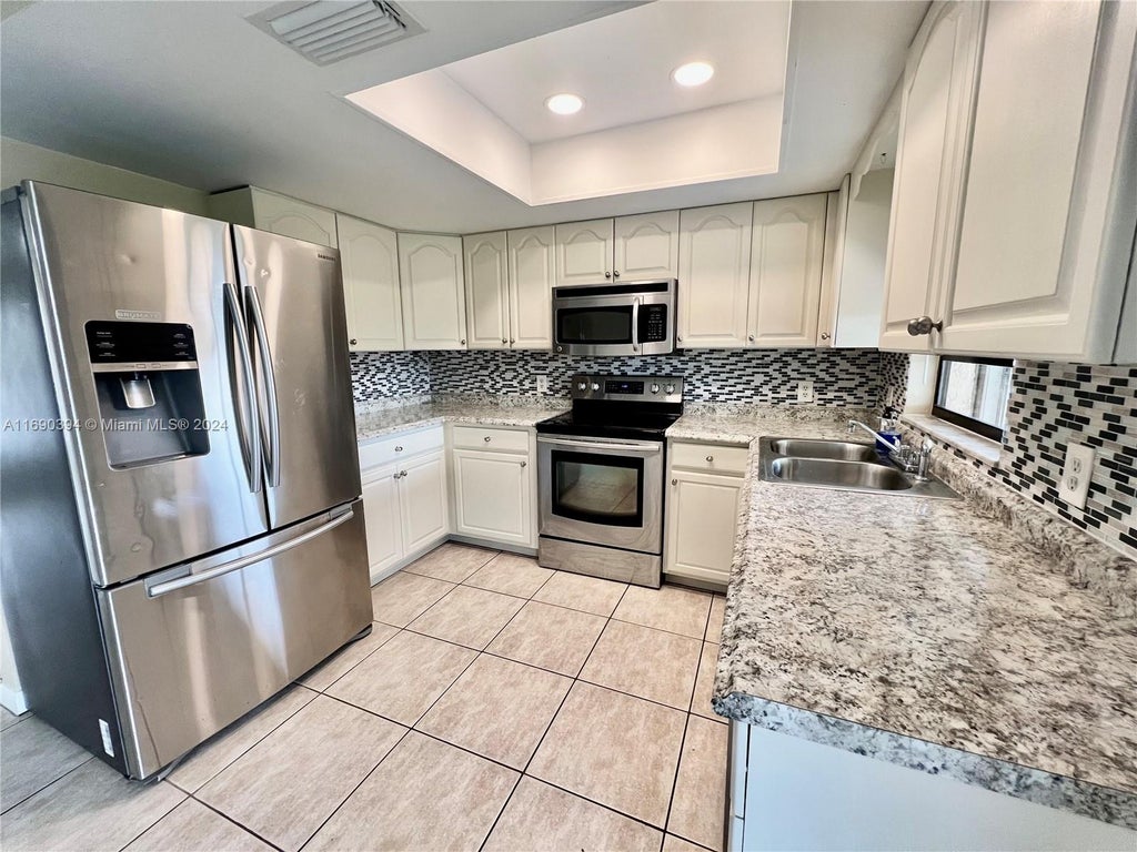 Photo of 202 SE Wallace Ter #202, Port Saint Lucie, FL 34983 (MLS # A11690394)