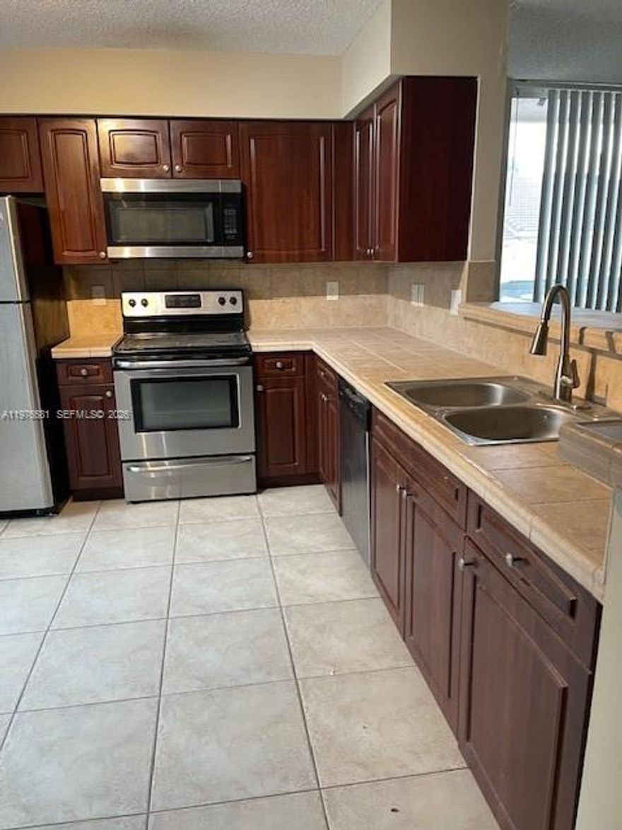 This is 3 bedroom and 2.5 bathroom located in the great community of Milano condo. large area downstairs with tile floor and a half bath. The 3 bedrooms upstairs have new laminated floors. Located in the prestigious gated Milano community with amenities such as a clubhouse, pool/spa, fitness center, volleyball courts, tennis courts, and computer room. Ideally located near Village Blvd with easy access to shopping, dining, downtown West Palm Beach, parks, and Palm Beach International Airport. Close to Village Commons Shopping Center, major roadways, and popular entertainment districts.