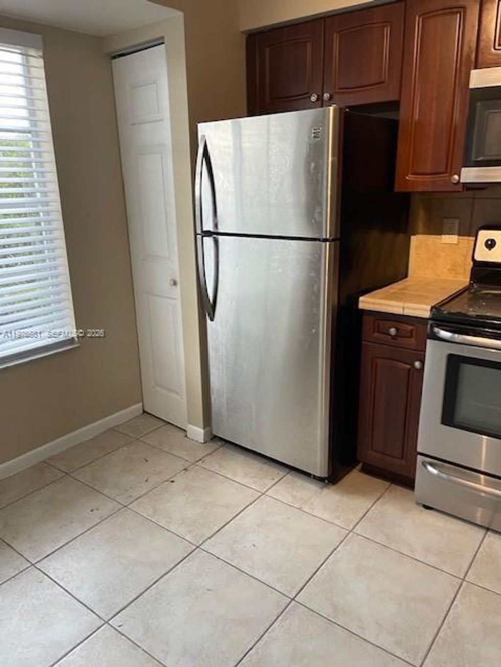 Photo of 1733 Village Blvd #111, West Palm Beach, FL 33409 (MLS # A11976581)