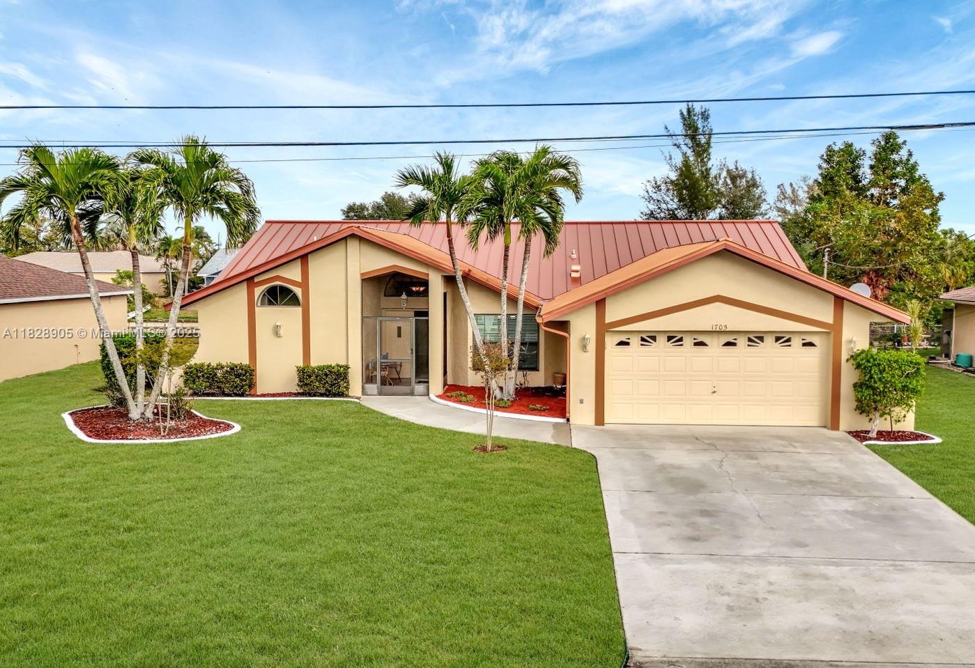 Waterfront, X FLOOD ZONE. Located in the heart of Cape Coral, This is a beautiful 3 bed 2-1/2 bath home on a freshwater canal that intersects with several other canals and leads to a local lake. Join the locals as you fish, kayak, or canoe on these canals. Out the back door is a small dock to fish & watch the local turtles & wildlife. This home is spacious, has a split plan with the master bedroom having his/her closets and a large bathroom. The kitchen was fully renovated in 2017 and includes REAL WOOD cabinets, double ovens and SS appliances. Recent updates include METAL Roof 2019, new AC 2021, Lanai was pavered 2022, Updated automatic water sprinklers 2023, GENERLINK emergency power hookup 2023, Exterior painted 2023, interior paint 2024. In the heart of the city, it's a great home!