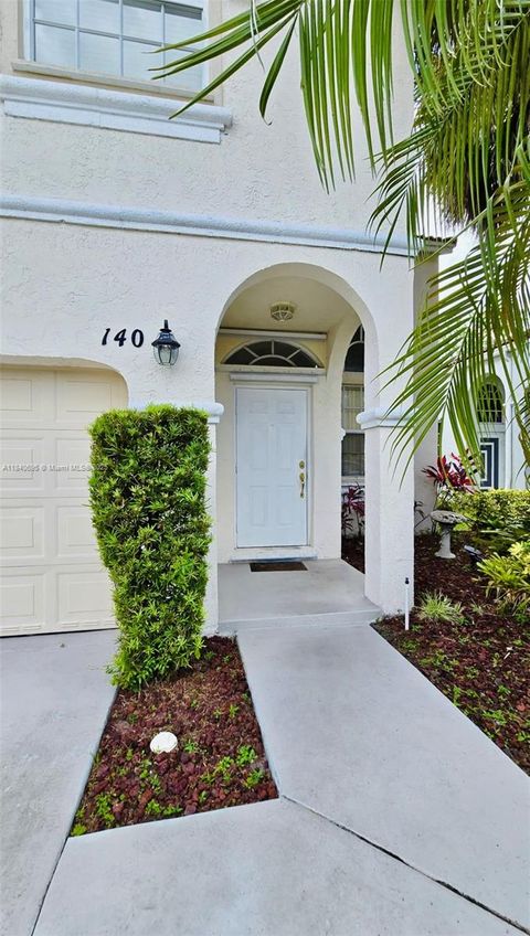 Photo of 140 NW 151st Ave, Pembroke Pines, FL 33028 (MLS # A11840695)