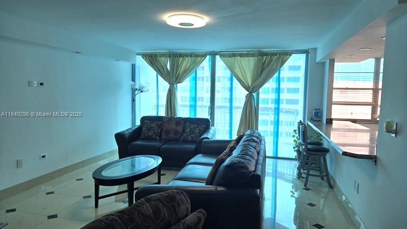 Spacious and beautifully remodeled 2 bed / 2 bath condo with 1,565 SF in the desirable Del Prado building. Located on the 15th floor with amazing water views from two balconies—one facing the ocean, the other overlooking Little Maule Lake and the skyline. Fully furnished and move-in ready with ceramic tile floors, modern kitchen with granite countertops and stainless steel appliances, updated baths, and great natural light. Enjoy resort-style living with a 5-star gym, tennis courts, marina, 2 pools, salon, mini-mart, restaurant, and 24/7 gated security. Prime Aventura location—close to shops, beaches, Aventura Mall, I-95, and more. Easy to show!