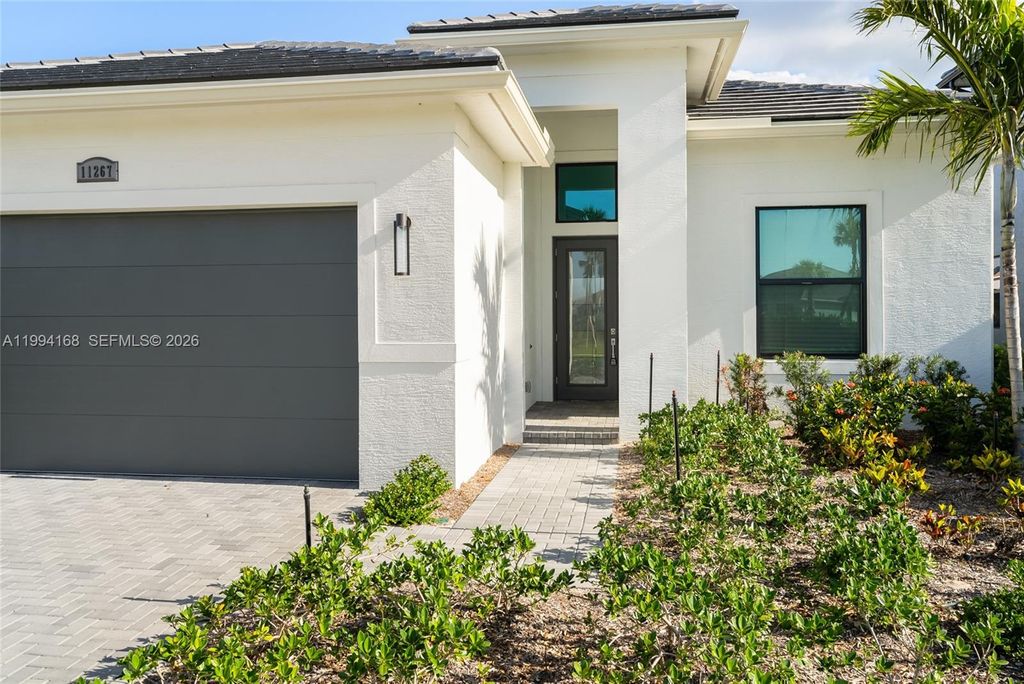 Photo of 11267 SW Pietra Way, Port St Lucie, FL 34987 (MLS # A11994168)