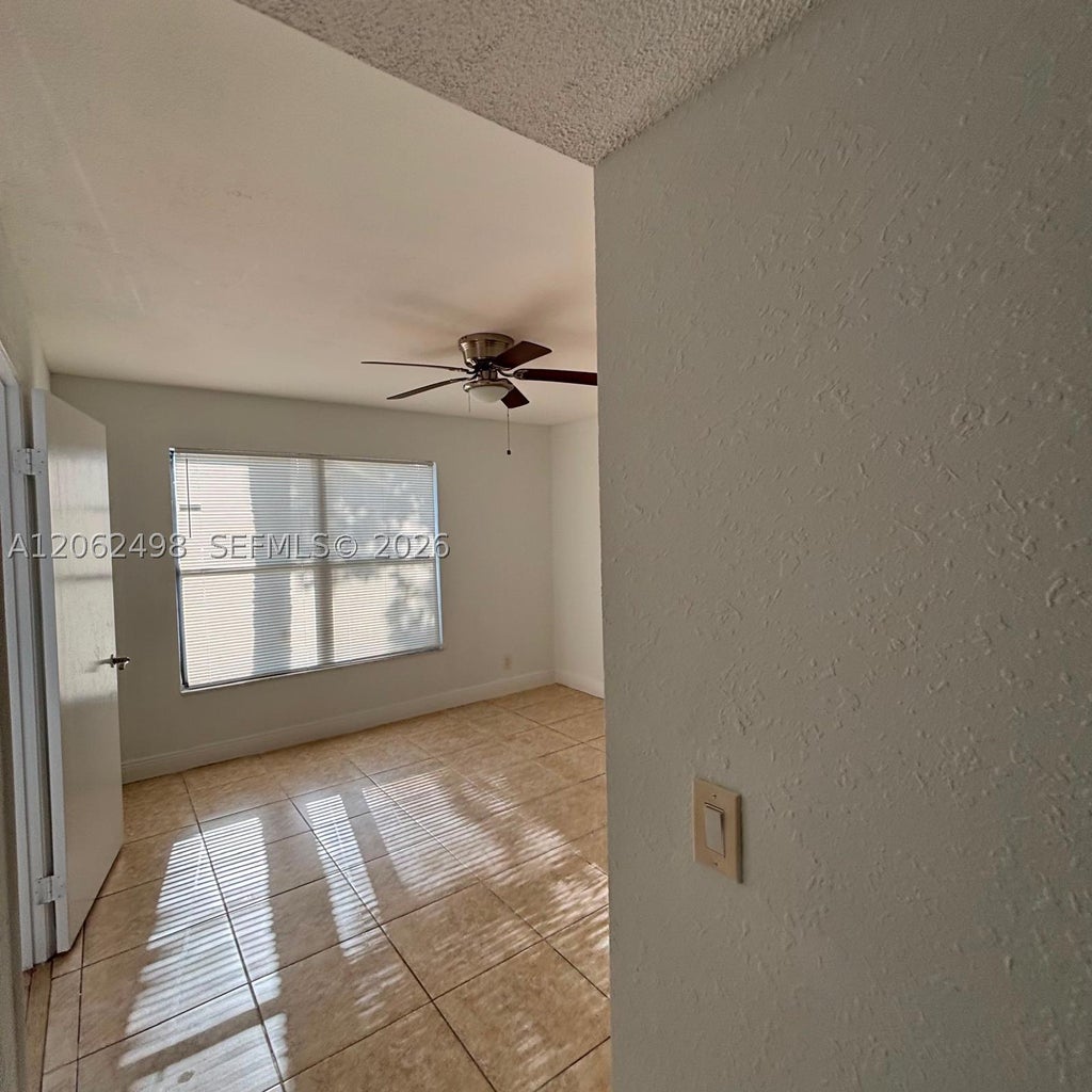 Photo of 1502 Lake Crystal Dr #A, West Palm Beach, FL 33411 (MLS # A12062498)