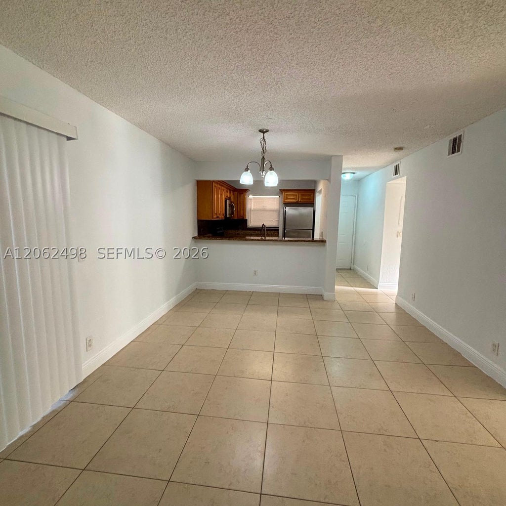 Photo of 1502 Lake Crystal Dr #A, West Palm Beach, FL 33411 (MLS # A12062498)