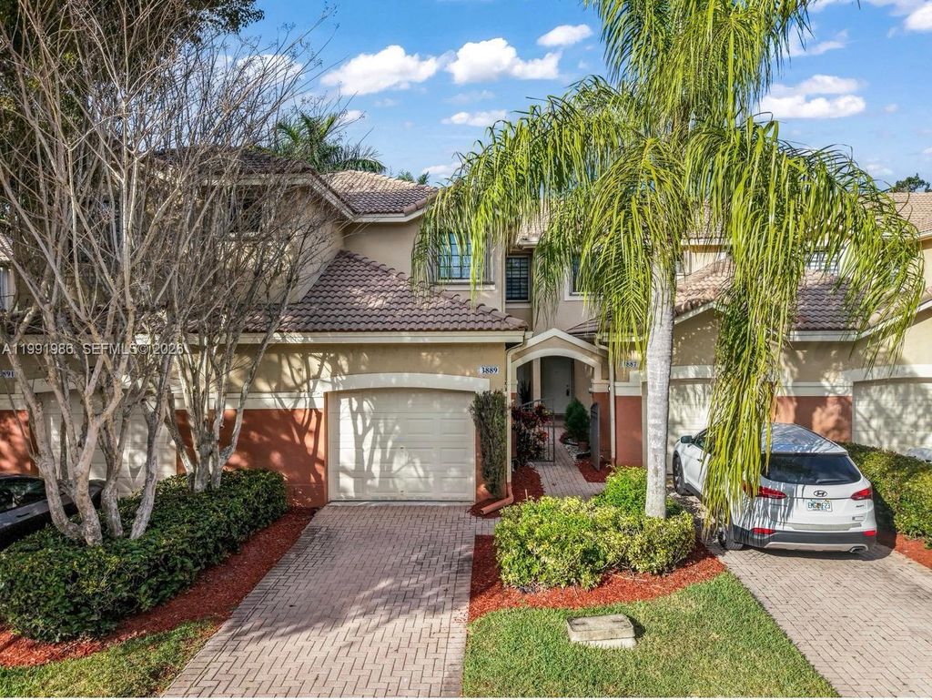 Photo of 3889 Tree Top Dr #3889, Weston, FL 33332 (MLS # A11991986)