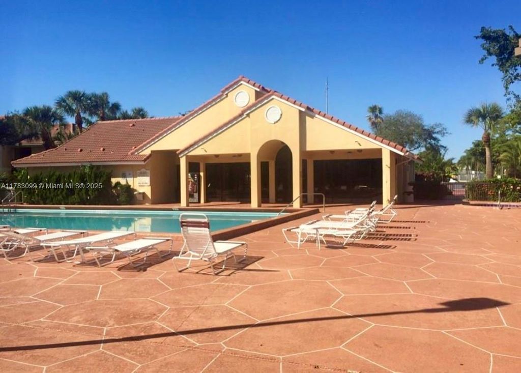 Photo of 5621 Riverside Dr #204A1, Coral Springs, FL 33067 (MLS # A11783099)