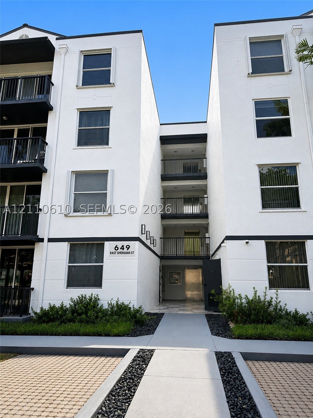 Photo of 649 E Sheridan St #304, Dania Beach, FL 33004 (MLS # A12110610)