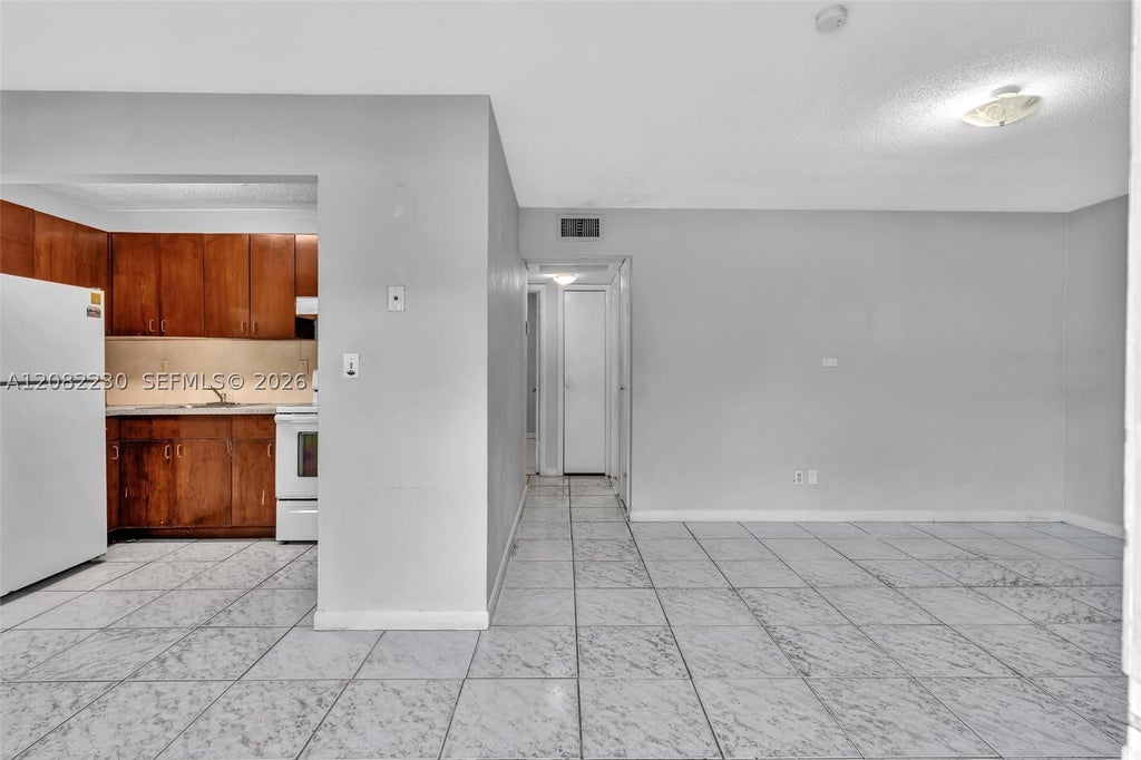 Photo of 4732 SW 33rd Ave #203, Dania Beach, FL 33312 (MLS # A12082230)