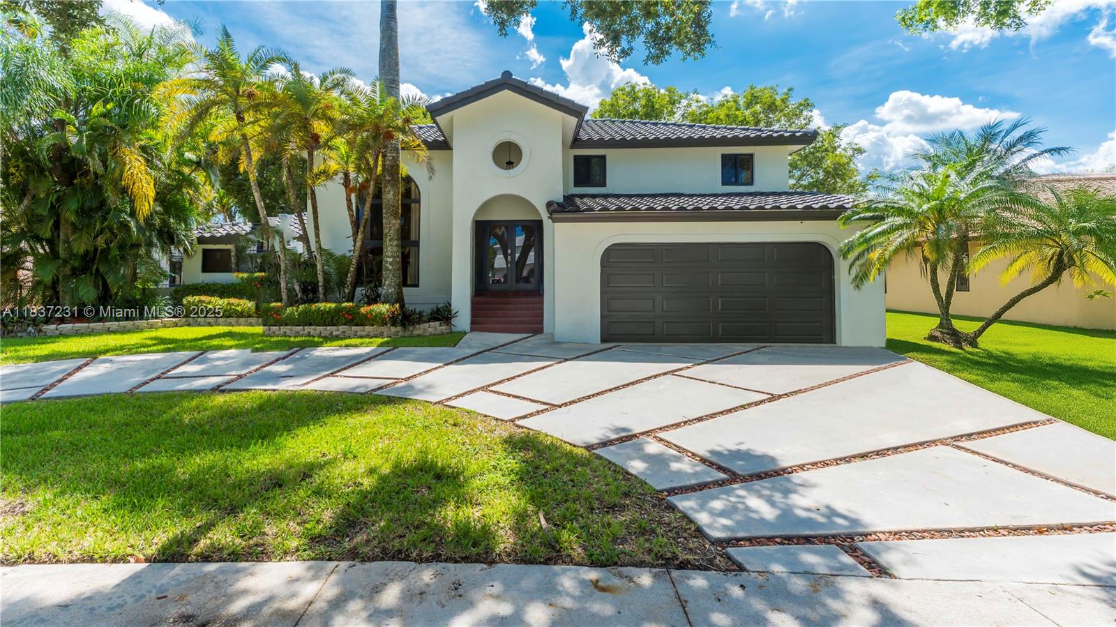 Welcome to your beautiful and forever home! If you are looking for your perfect family home, look no further, this is it, but hurry this beauty will not last on the market! This beautifully updated 4 bed, 3.5 bath gem offers two master suites—one upstairs, one on the main level—perfect for multigenerational living. Enjoy an updated kitchen, upgraded bathrooms, and peaceful lake views where lasting memories are made. Hurricane impact windows, new kitchen appliances, freshly painted neutral interior and exterior--too many upgrades to list! Nestled in the heart of family-friendly Ivanhoe’s Falcons Lea, and zoned for top-rated A+ schools, this move-in-ready home is where comfort, warmth, and community come together. The lifestyle your family deserves starts here!
