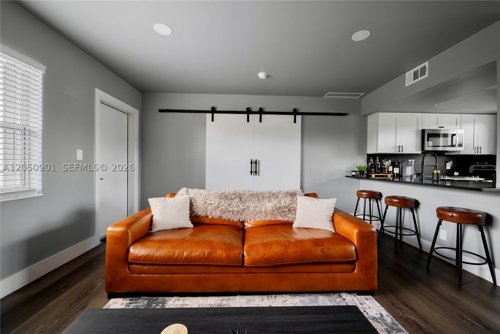 Photo of 609 NE 13th Ave #302, Fort Lauderdale, FL 33304 (MLS # A12050901)