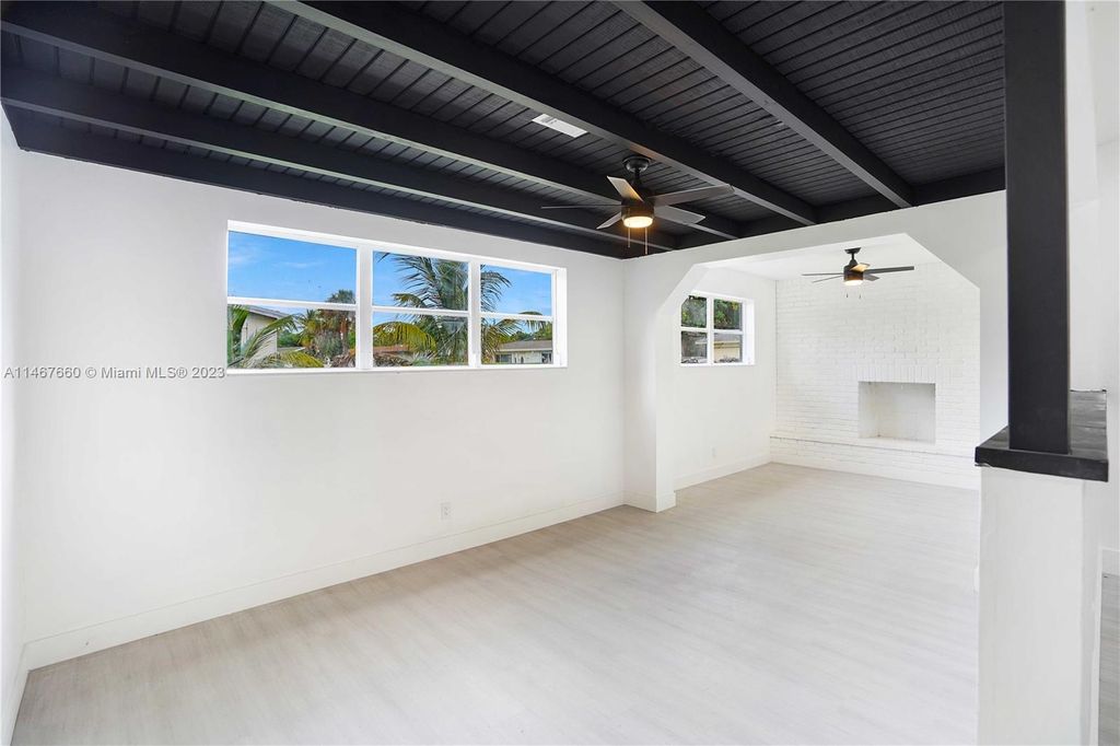 Photo of 1624 Boardman Ave, Mangonia Park, FL 33407 (MLS # A11467660)