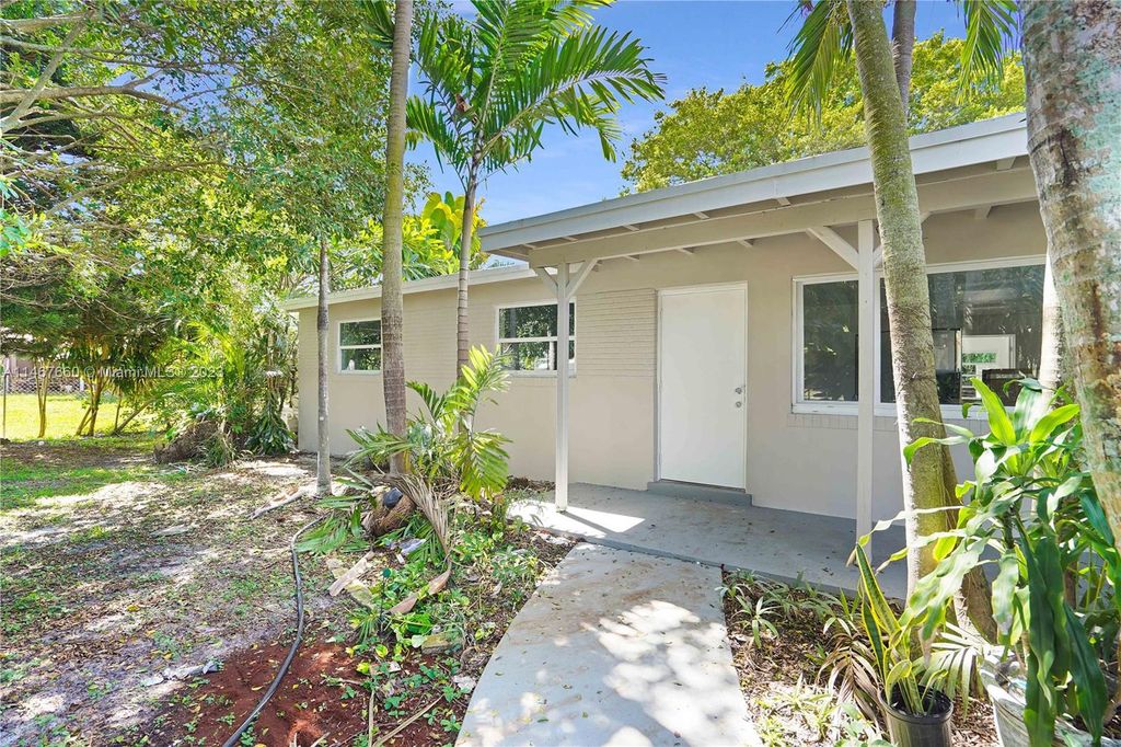 Photo of 1624 Boardman Ave, Mangonia Park, FL 33407 (MLS # A11467660)