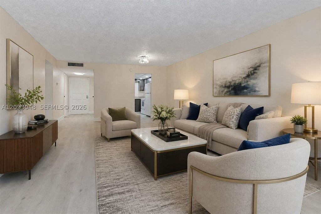 Photo of 6001 N Falls Cir Dr #309, Lauderhill, FL 33319 (MLS # A12093048)