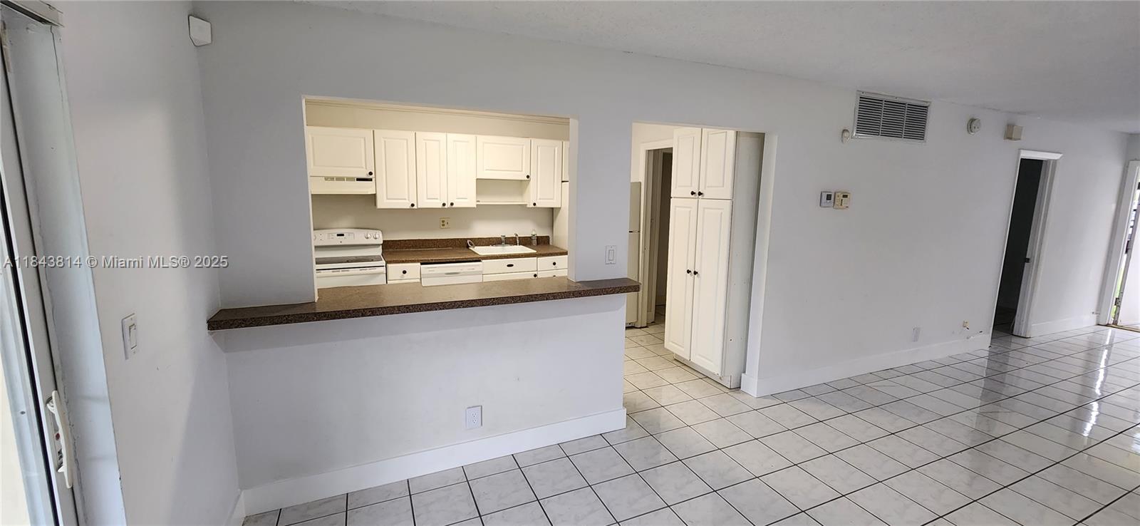 Best Priced 3 bedroom around. Good condition. Not a fixer upper.
Impact windows, modern white kitchen with glass top range, ample cabinets, full size washer dryer, 2 parking spaces, large patio area, tile floors, modern baseboards.
Single story 4 unit building.
Building recently painted.
Building passed 50 year inspection last year. No anticipated special assessments.
Great Location. Great Condition. Seller priced this for a fast sale.