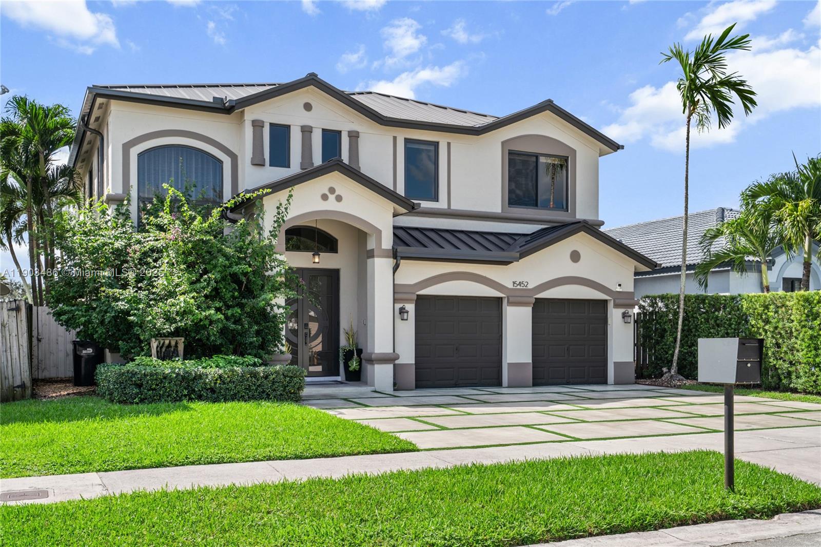 Beautiful 4-Bedroom Home. Enjoy the best of Miami living in this modern single-family home with a brand-new roof, new driveway, and all new impact windows. Features marble floors throughout and real wood floors on the second level. Spacious layout with floor-to-ceiling glass doors and electric window treatments. Relax by the pool, host barbecues, or use the first-floor bedroom as an office or guest room. Located in an A+ school district, close to bike and walking paths. Includes custom lighting, shades in all rooms, a luxurious master suite with walk-in closet, central air, smart thermostat, and Ring Doorbell. Modern style, comfort, and location. All in one home!