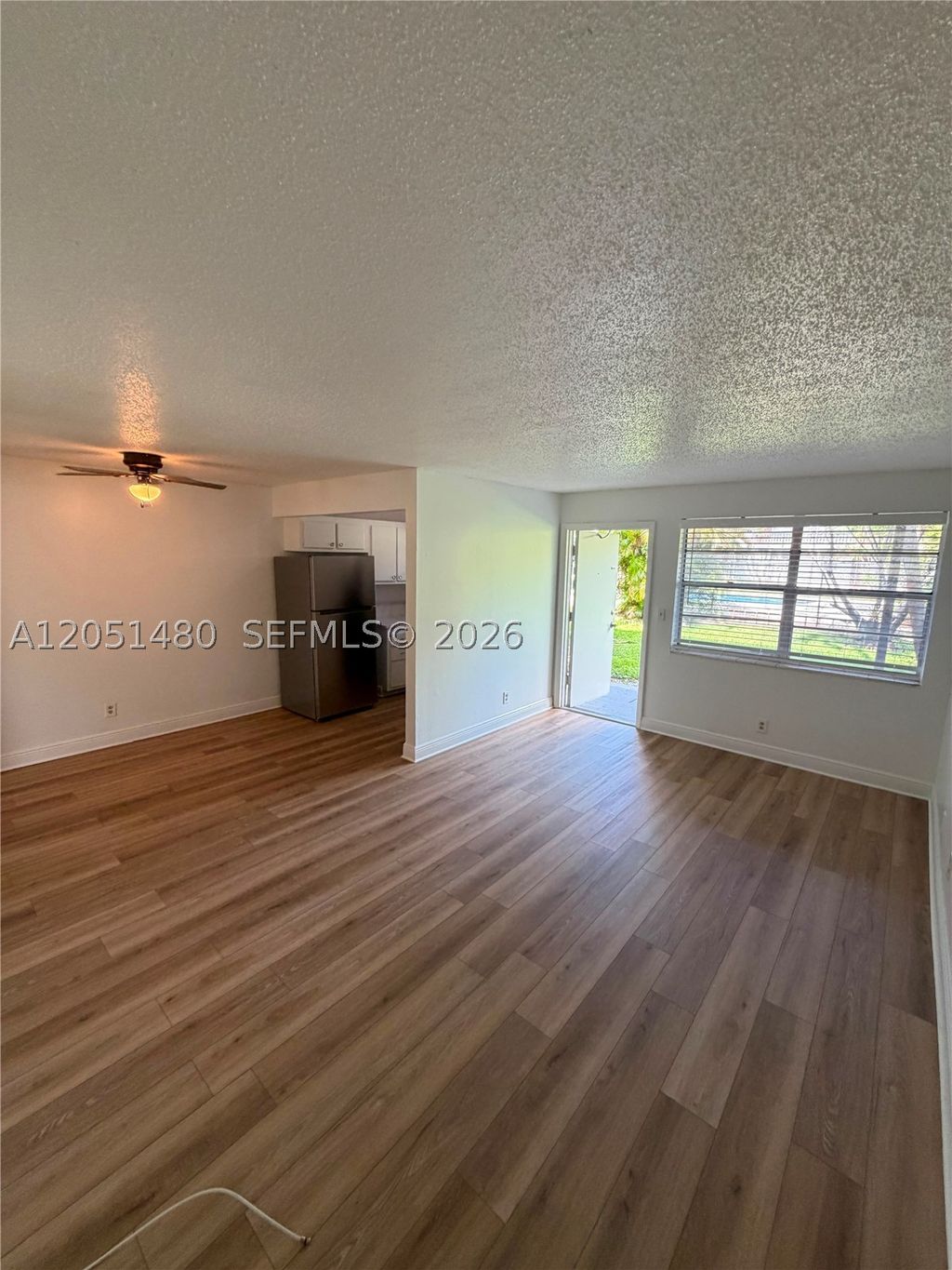 Photo of 7041 Sunset Strip #109, Sunrise, FL 33313 (MLS # A12051480)