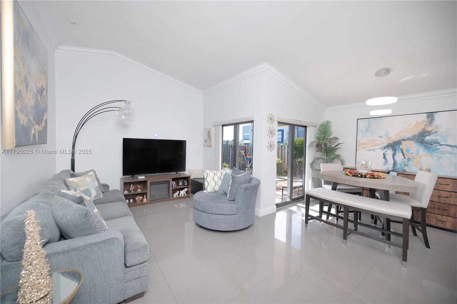 Discover a modern corner unit oasis inside the gated community of The Moors in Hialeah! This fully renovated townhome features a stylish kitchen with quartz countertops, stainless steel appliances, sleek ceramic floors, and a spacious private patio perfect for relaxing or entertaining. As a corner unit, you enjoy extra privacy and natural light. The HOA covers roof maintenance, cable, internet, and exterior upkeep, helping lower your homeowner’s insurance cost. Resort-style amenities include pools, a fitness center, tennis courts, a clubhouse, and 24/7 security. Prime location near shopping, dining, and quick highway access. Move-in ready and waiting for you!