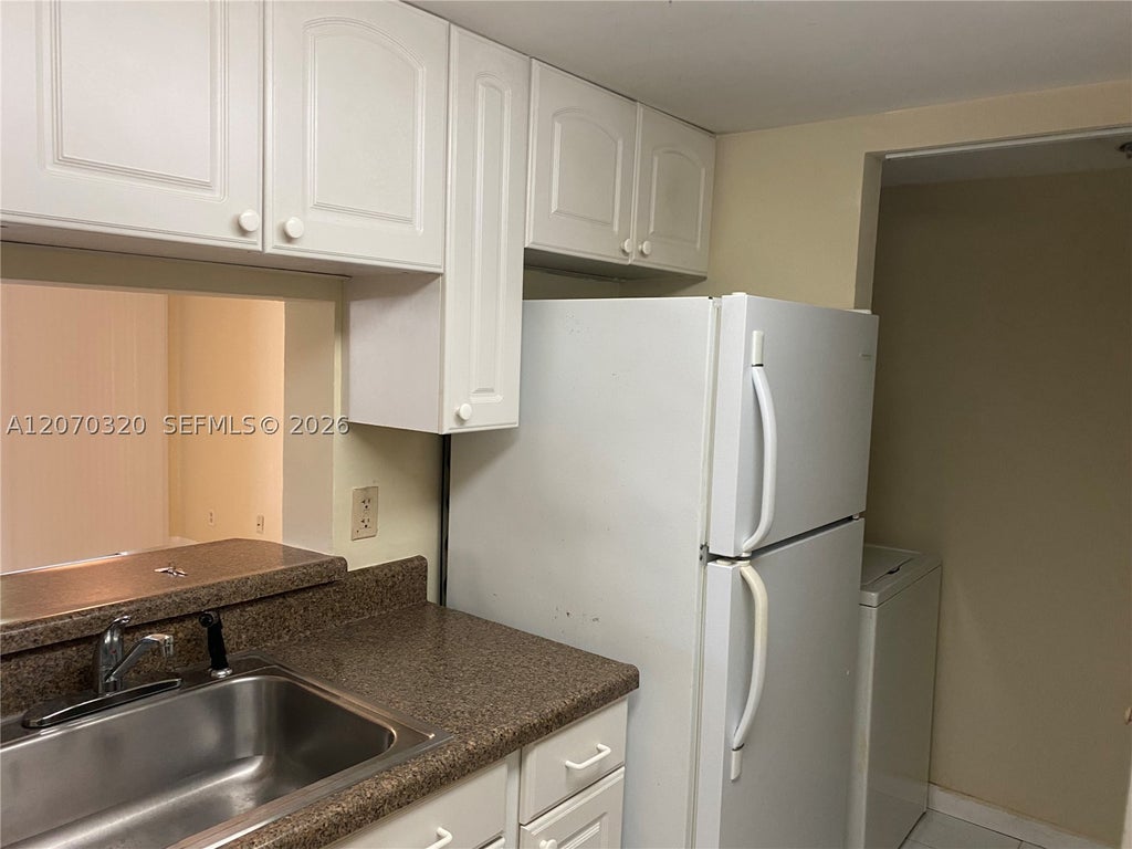 Photo of 9755 Westview Dr #1215, Coral Springs, FL 33076 (MLS # A12070320)