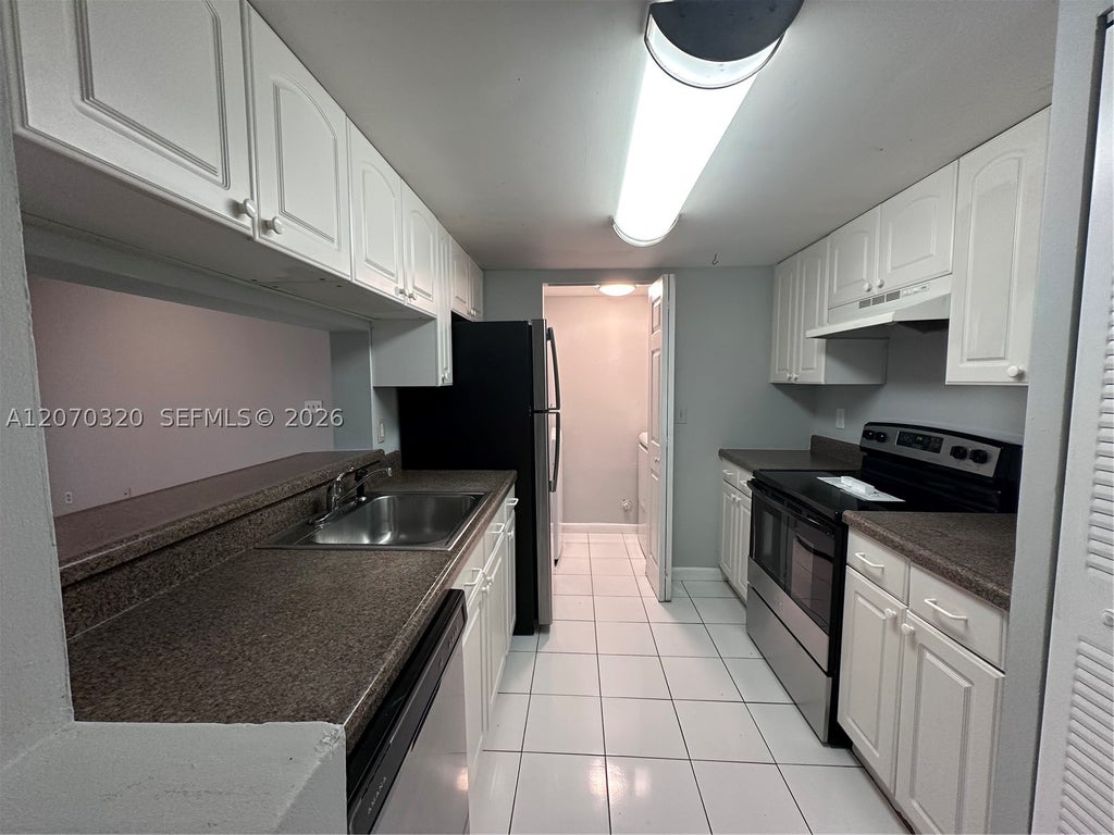 Photo of 9755 Westview Dr #1215, Coral Springs, FL 33076 (MLS # A12070320)