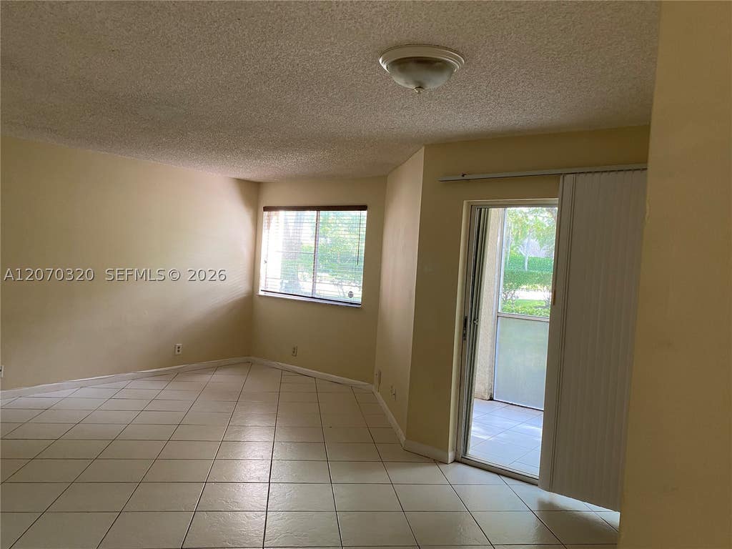Photo of 9755 Westview Dr #1215, Coral Springs, FL 33076 (MLS # A12070320)