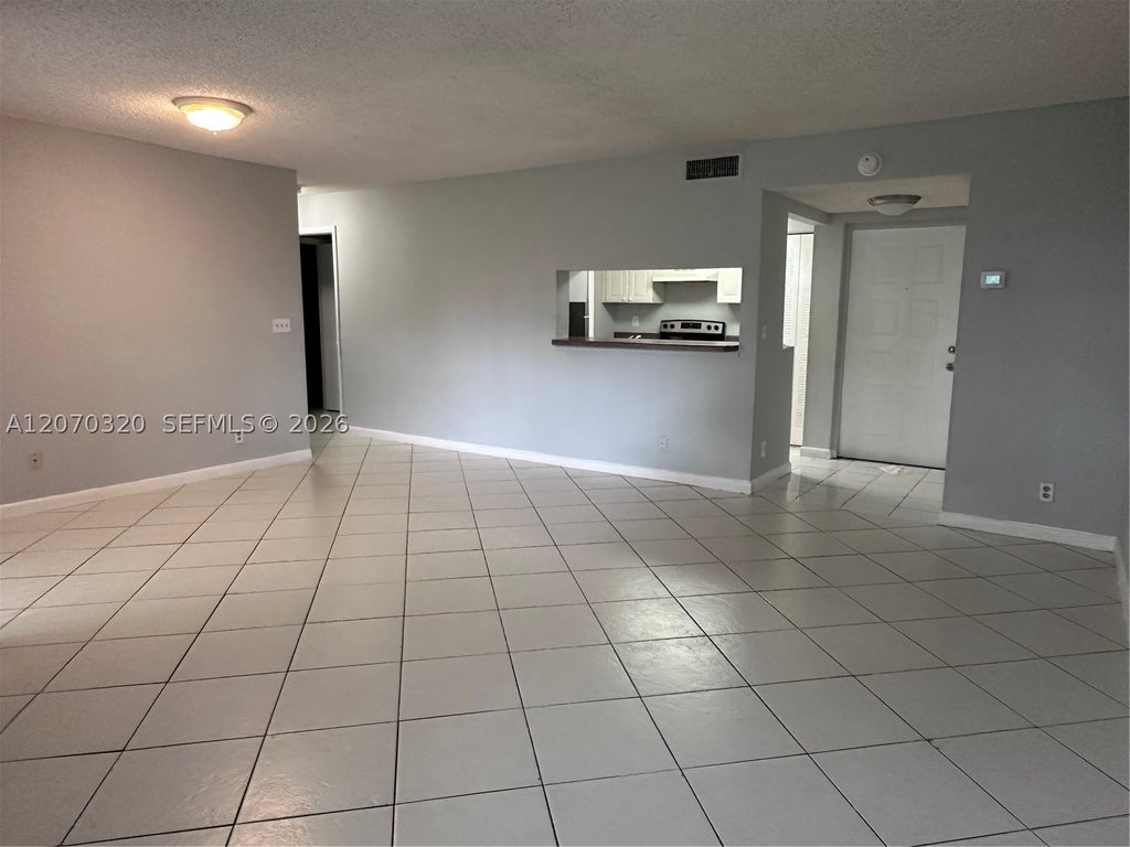 Photo of 9755 Westview Dr #1215, Coral Springs, FL 33076 (MLS # A12070320)