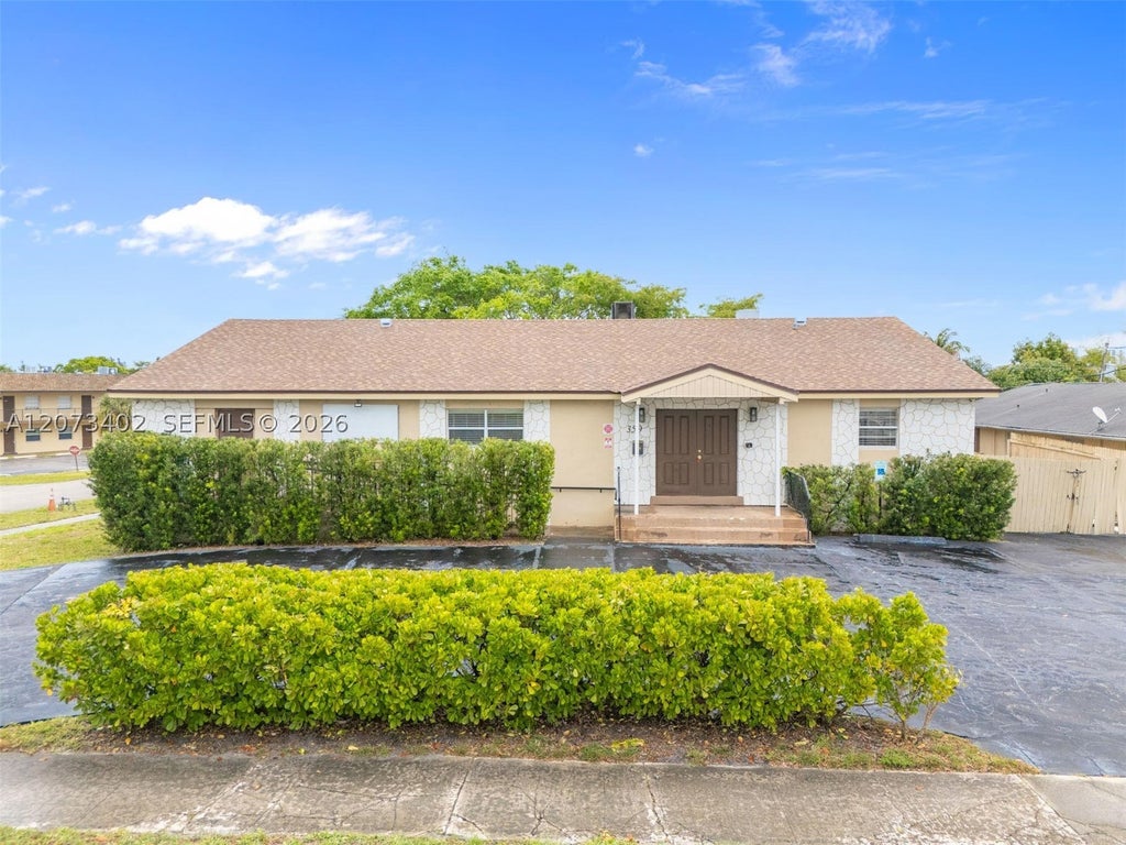 Photo of 359 10th St, Lake Park, FL 33403 (MLS # A12073402)