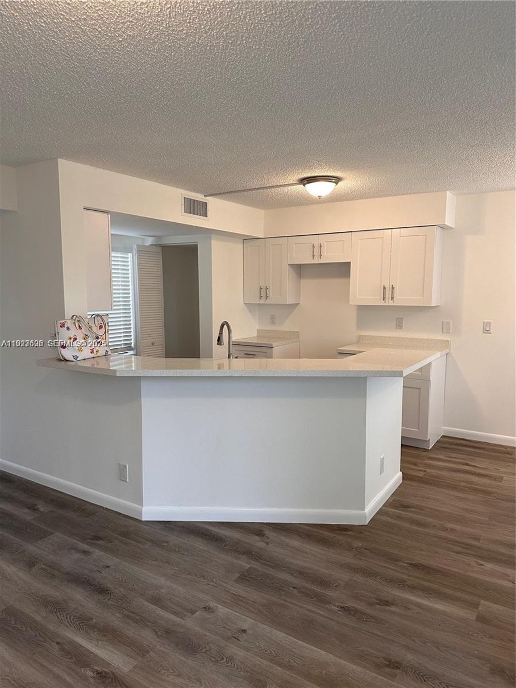 Photo of 9999 Summerbreeze Dr #301, Sunrise, FL 33322 (MLS # A11927606)
