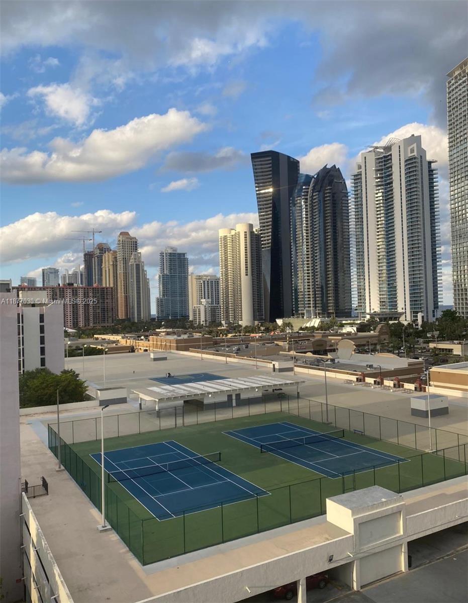 Great opportunity to live in Sunny Isles. 1 bedroom 1.5 baths. all tile and bedrooms wood like floors. Easy to show.
