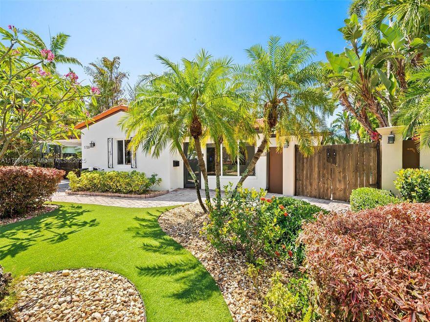 Discover this tastefully renovated dream oasis in prestigious Poinsettia Heights. Set on a professionally landscaped corner lot, this 4-Bedroom, 2-Bath home boasts an open-concept plan & ceramic tile floors, perfect for modern living. Impact windows & doors offer security & efficiency, while the updated kitchen featuring quartz countertops shines with stainless steel appliances. Step outside to your resort-style salt pool with a sun shelf & waterfall as your private retreat, surrounded by lush vegetation, beautiful trees, & privacy wall. Enjoy the perfect blend of style & comfort. Relax in the huge screened-in porch with a Private Sauna. Minutes from  everything, this stunning updated property is move-in ready & designed for relaxation & entertaining.