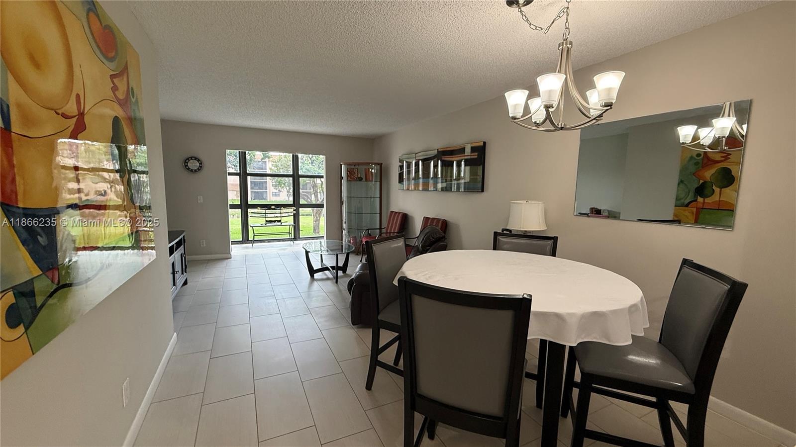 Sunrise Lakes Phase 4. 55+ community with fantastic clubhouse and amenities including free 9-hole golf course. Furnished and updated unit with all tiled floors. Balcony was turned into enclosed impact glass sun-area for extra living space. 2/2 with washer and dryer. Come see soon!