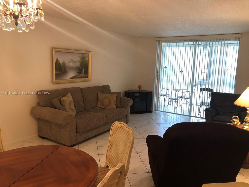 Photo of 609 NE 14th Ave #303, Hallandale Beach, FL 33009 (MLS # A11647482)
