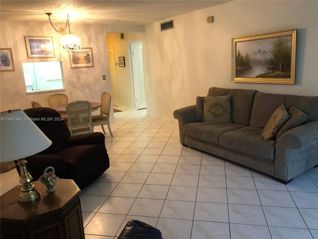 Photo of 609 NE 14th Ave #303, Hallandale Beach, FL 33009 (MLS # A11647482)
