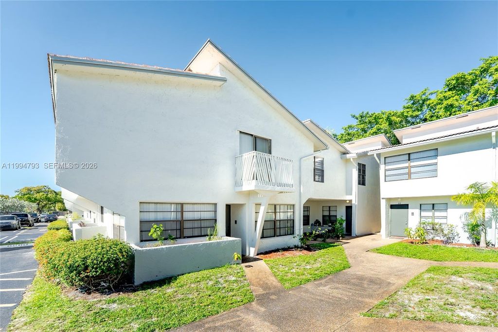 Photo of 2570 Coral Springs Dr #2570, Coral Springs, FL 33065 (MLS # A11994793)