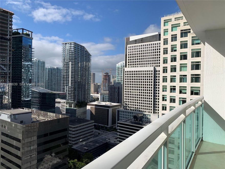 Live in one of Brickell’s most desirable locations. This corner 1-bedroom, 1-bath residence on the 28th floor offers impressive views of Brickell Avenue, the pool deck, and the water. The unit features stainless steel appliances, granite countertops, and porcelain flooring in the kitchen and bathroom, combining durability with a clean, modern finish. The building offers a full suite of amenities, including a fitness center and spa, steam room, infinity-edge pools, concierge service, and a resident club room with billiards, creating a well-rounded lifestyle experience.
