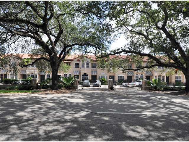 Rarely available "Gables Place" - total kitchen renovation, upgraded bathrooms, freshly painted, refinished wood floors & 5" baseboards, high ceilings on both levels, Formal DR, Family room with sliding doors to extra large brick patio; perfect for BBQ's and gardening, - Walk to Downtown Coral Gables' with 250 restaurants, businesses, shops & trolley - townhome in gated compound of 15 units just north of Coral Gables City Hall, 2 parking spaces within steps of the front door!
