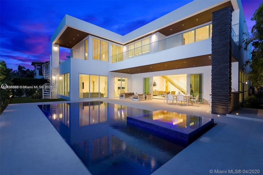 1261 99th St in Bay Harbor Islands is an exceptional 8-bedroom, 8.5-bath residence offering the perfect blend of space, luxury, and comfort. Designed for modern living, the home features expansive interiors with elegant finishes, abundant natural light, and seamless flow throughout. The gourmet kitchen, spacious living areas, and oversized bedrooms make it ideal for both family living and entertaining. Step outside to a private backyard oasis with a sparkling knife edge pool, lush landscaping, and covered lounge areas. Move-in ready and perfectly located near Bal Harbour Shops, top-rated schools, and the beach.