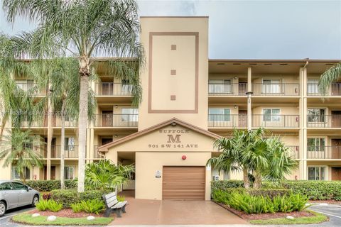 Photo of 901 SW 141st Ave #102M, Pembroke Pines, FL 33027 (MLS # A11982874)