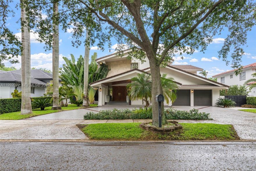Exceptional opportunity in the prestigious Royal Oaks community of Miami Lakes. This expansive 5-bedroom 5 1/2 bath home offers a highly desirable floor plan with three private suites, including one conveniently located on the first floor. Grand foyer and formal dining spaces are enhanced by soaring ceilings, rich wood detail, and a striking arched statement window that brings in beautiful natural light. Travertine flooring runs throughout the main living areas, with wood floors in four of the bedrooms for added warmth and elegance. The spacious kitchen features granite countertops, abundant cabinetry, and direct access to the home’s inviting entertaining areas. Outdoors, enjoy a private pool with a full cabana bath, ideal for effortless indoor-outdoor living. Recent updates include a refinished salt water pool, upstairs A/C approximately 3 years old, water heater approximately 3 years old, impact rear doors, impact windows in the living room and dining room, and insulated garage doors. A rare Miami Lakes home with scale, architectural character, and outstanding potential.