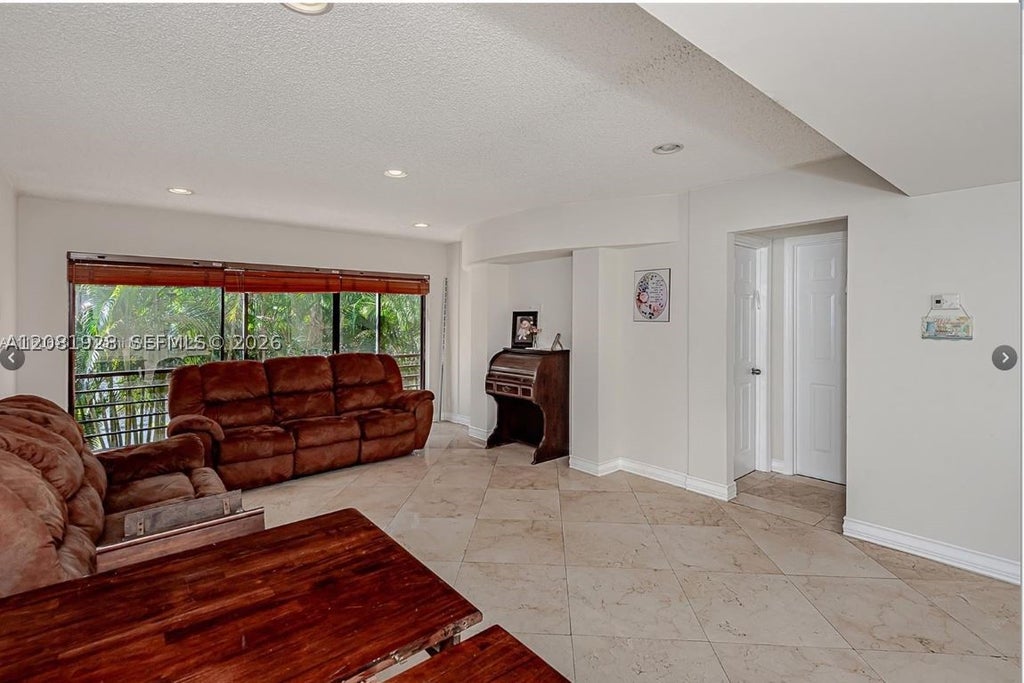 Photo of 4000 N Hills Dr #29, Hollywood, FL 33021 (MLS # A12081928)