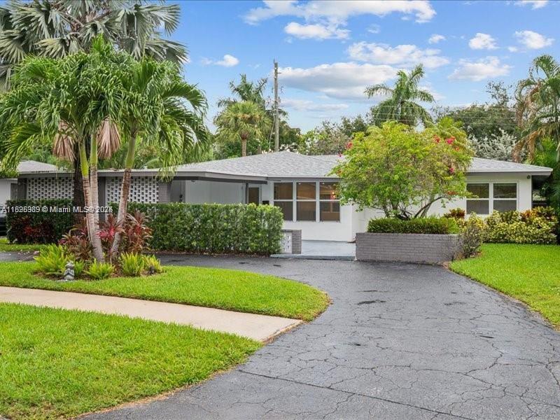 This beautifully renovated home offers the perfect blend of style, comfort & convenience. Located less than 4 miles from the beach & with easy access to major highways: it’s ideal for enjoying South Florida living at its best. Step inside to find a modern open layout featuring a newer roof, hurricane-impact windows & doors & a completely updated kitchen with quartz countertops, 42" upper cabinets, & sleek, contemporary finishes. The bathrooms are tastefully remodeled with high-end fixtures & designer touches that create a spa-like experience.
Enjoy year-round comfort with a newer central A/C system & relax or entertain in your private, fenced backyard perfect for pets, gatherings, or peaceful outdoor living. Stylish Move-in-ready home in prime location.
SHOWINGS WILL START ON JULY 5