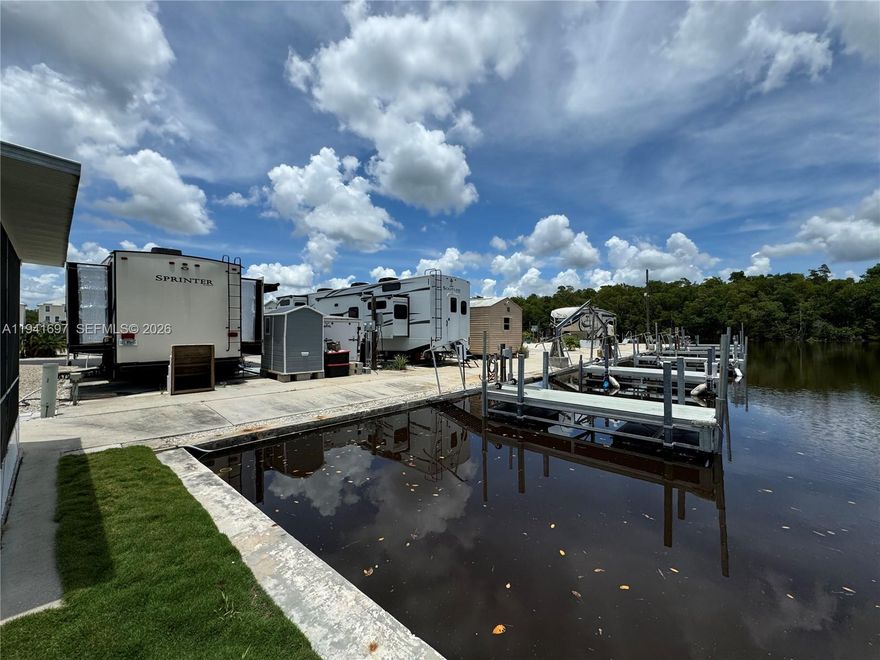 Waterfront lot number 38 in Fisherman's Cove, Everglades City. This lot is strategically located next to the boat ramp, fish-cleaning- station, and laundry. Deeded boat dock with water and power directly behind property and outside of main channel. Property faces north and measures 30X50 Ft and can accommodate up to a 44 Ft trailer. Included is a 10X10 metal shed, a screened gazebo, and a new water purification system. Park your RV/Mobile home and enjoy the sea breeze surrounded by nature. Additional gated parking available for boats/trailers. Adjacent lot #37 also for sale for $175,000. Owner financing available.