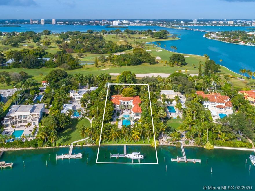 Rebuilt and remodeled (2017) Estate on private Indian Creek Island, w/24hr police force & 18-hole championship golf course/club.  Large 1.25 acre lot.  Dubbed the "Billionaire Bunker" by Forbes, this 300-acre island has less than 40 home sites! 8BR, 12BA, elevator, office, huge gym (could be 9th BR) w/steam shower & water views.  Huge dock w/lifts.  New resort-style pool w/multiple entertainment areas. This magnificent home is the least expensive property (home or lot) available on Indian Creek Island.  Reduced for a quick sale!