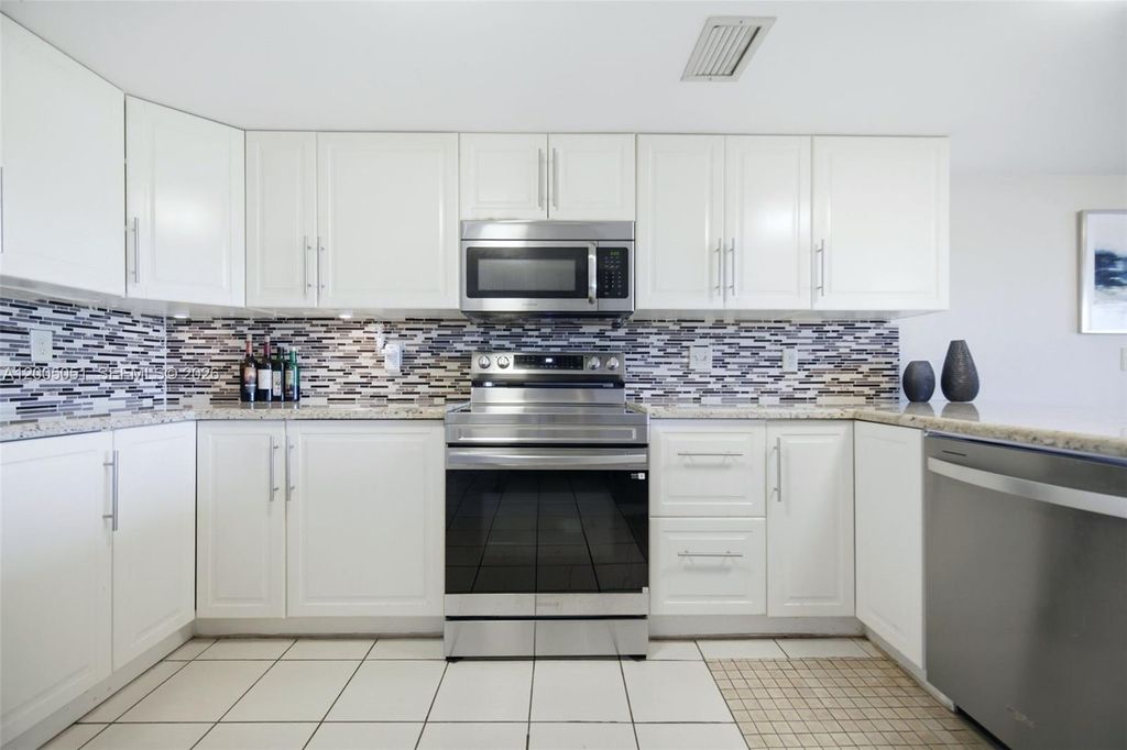 Photo of 2750 NW 80th Ave, Sunrise, FL 33322 (MLS # A12005051)