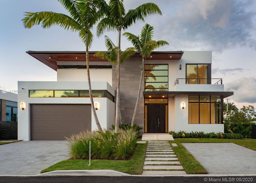 BAY HARBOR ISLANDS-PRESTIGIOUS COMMUNITY-BRAND NEW STATE OF THE ART 6 BEDROOM PLUS OFFICE/DEN, 6 1/2 BATH CONTEMPORARY HOME ON PRIME CORNER LOT. OVER 5100 SF OF LIVING AREA & OVER 6800 TOTAL SF. TOP OF THE LINE FINISHES TO INCLUDE LIMESTONE & WOOD FLOORS THROUGHOUT, SPECTACULAR KITCHEN WITH HIGH END APPLIANCES AND QUARTZ COUNTERTOPS, ELEVATOR, FLOOR TO CEILING GLASS PLUS MUCH MORE. FABULOUS COVERED TERRACE WITH SUMMER KITCHEN, HEATED POOL & JACUZZI. MOVE IN READY.