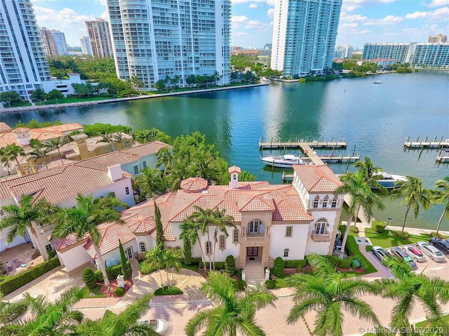 AVENTURA MOST EXCLUSIVE WATERFRONT VILLA IN THE PRESTIGIOUS, PRIVATE GATED COMMUNITY OF ISLAND ESTATES. CELEBRATED OPULENCE & TIMELESS LUXURY IN THIS MEDITERRANEAN MANSION WITH 6 BR/8.5 BA, OVER 7,300SQFT  WATER VIEWS, PRIVATE MARINA. GREAT FOR ENTERTAINMENT OPEN FLOOR PLAN, HIGH CEILINGS,  ELEVATOR, DUAL HUGE MASTER BEDROOMS, WINE ROOM, WET BAR, FIREPLACE, STEAM SHOWER, HEATED POOL/SPA, GOURMET & OUTDOOR KITCHEN, 2 STORY FOYER, OUTDOOR TERRACE, 50' BOAT SLIP INCLUDED DEEDED DOCK. A TRUE OASIS, LIVE ON YOUR OWN PRIVATE ISLAND . ENJOY THE AMENITIES OF PRIVE FIVE START RESORT, TENNIS COURTS, SPA, INDOOR LAP POOL, HAIR SALON, 3 RESTAURANTS, CIGAR LOUNGE, MARINA FOR YACHTS, KIDS PLAYGROUND, DOGGIES HILL PLAY AREA, WALKING/RUNNING TRAIL & MUCH MORE!!
