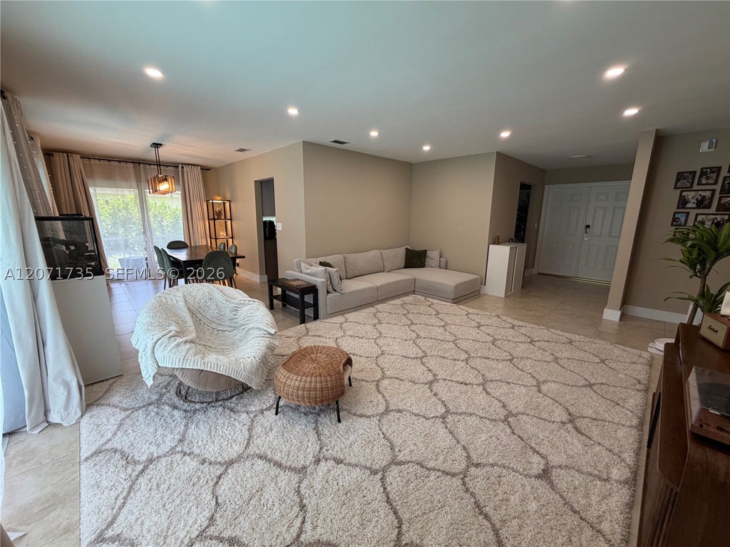 Photo of 8203 NW 37th St, Coral Springs, FL 33065 (MLS # A12071735)