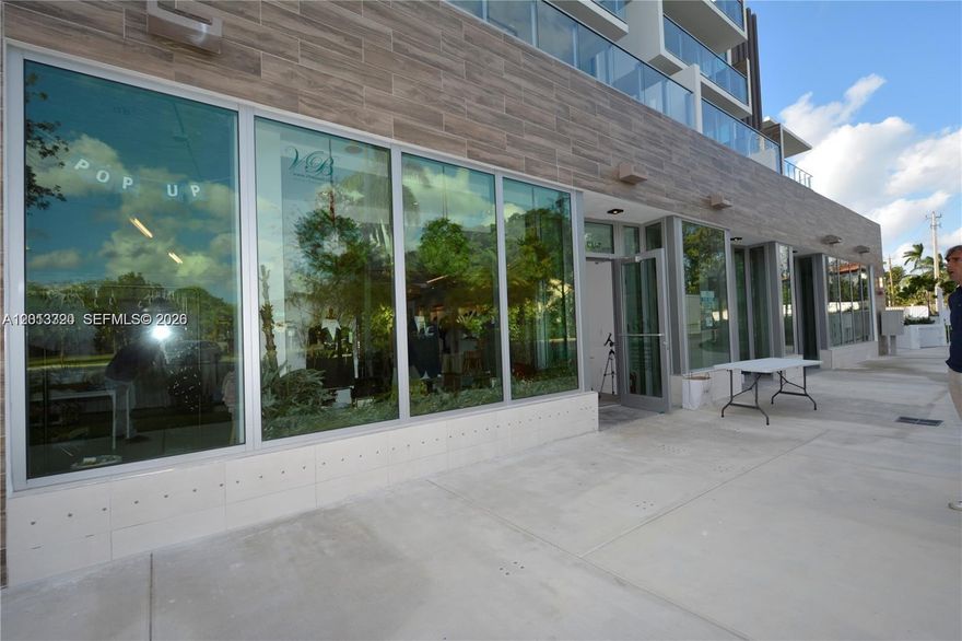 Highly desirable street-front retail space featuring floor-to-ceiling glass walls, ideally positioned just outside the gates of the prestigious Sunset Harbor residential community. This modern, upscale commercial condo is located in PALAU Sunset Harbour and offers excellent visibility from Alton Road, benefiting from strong daily traffic exposure. Beautifully designed and move-in ready, the space is perfectly suited for high-end fashion retail or a variety of upscale commercial uses.